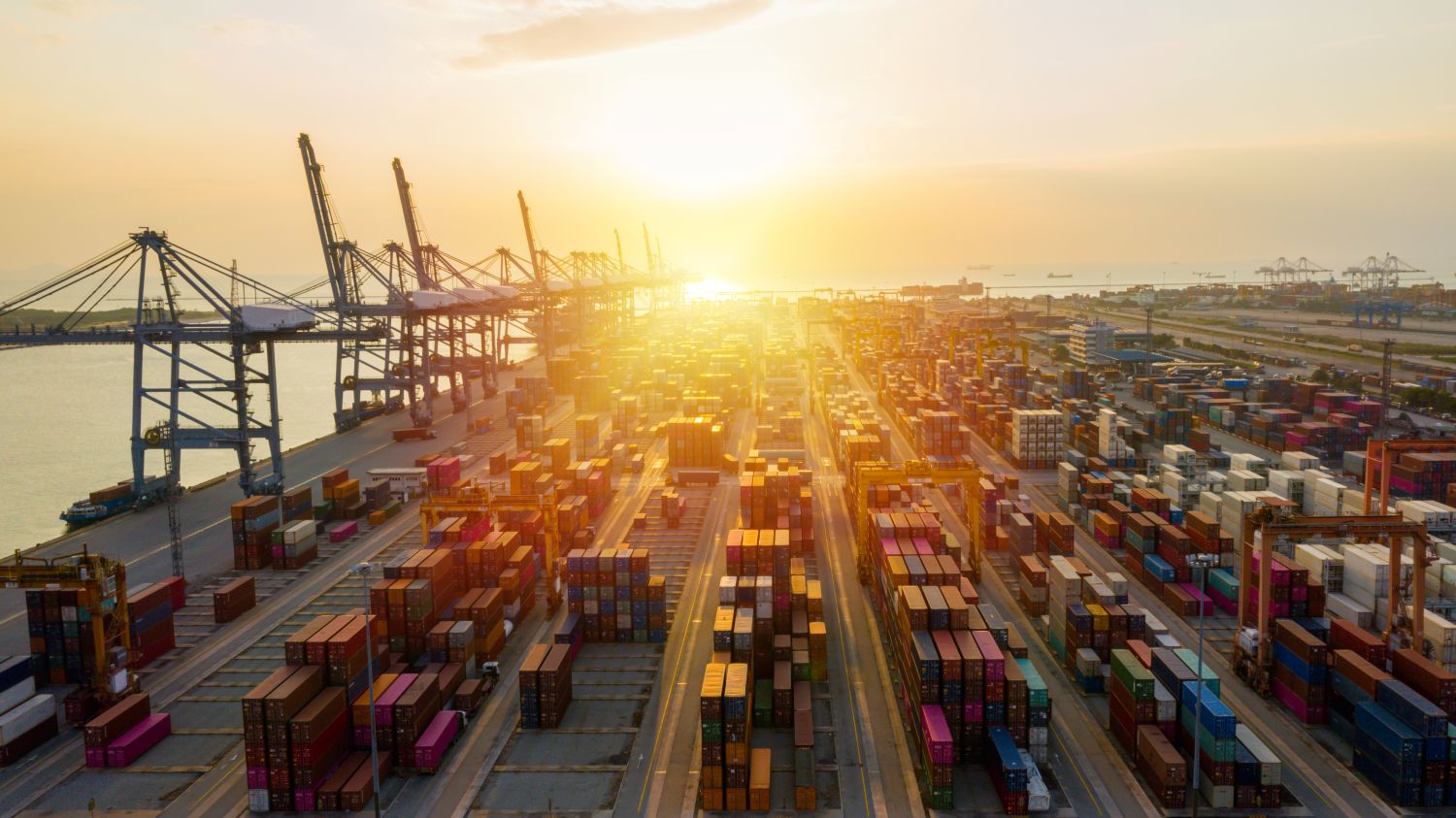 Loading and unloading containers for international transport.